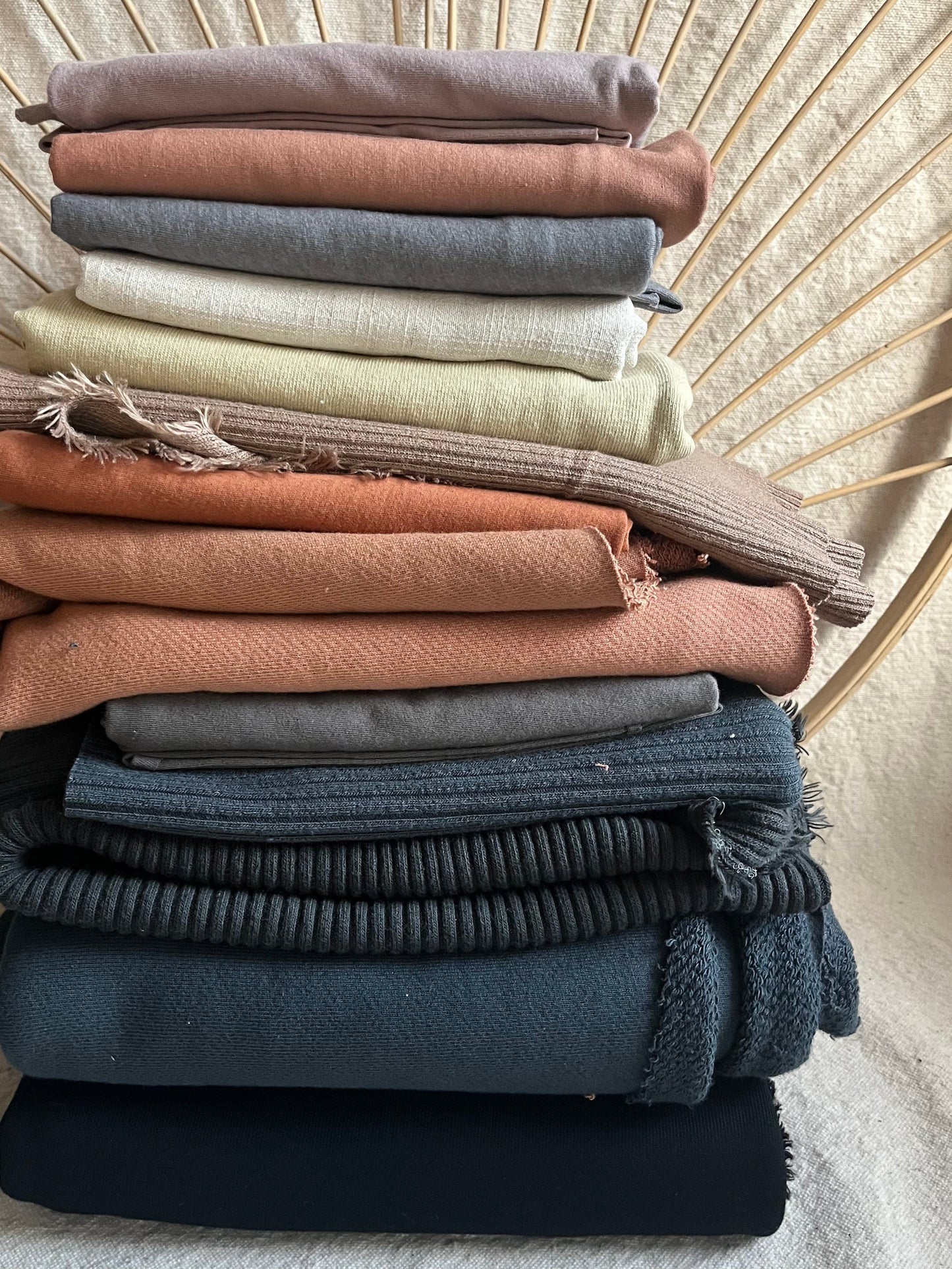 Stack of colorful fabric samples - 6268038E-6B07