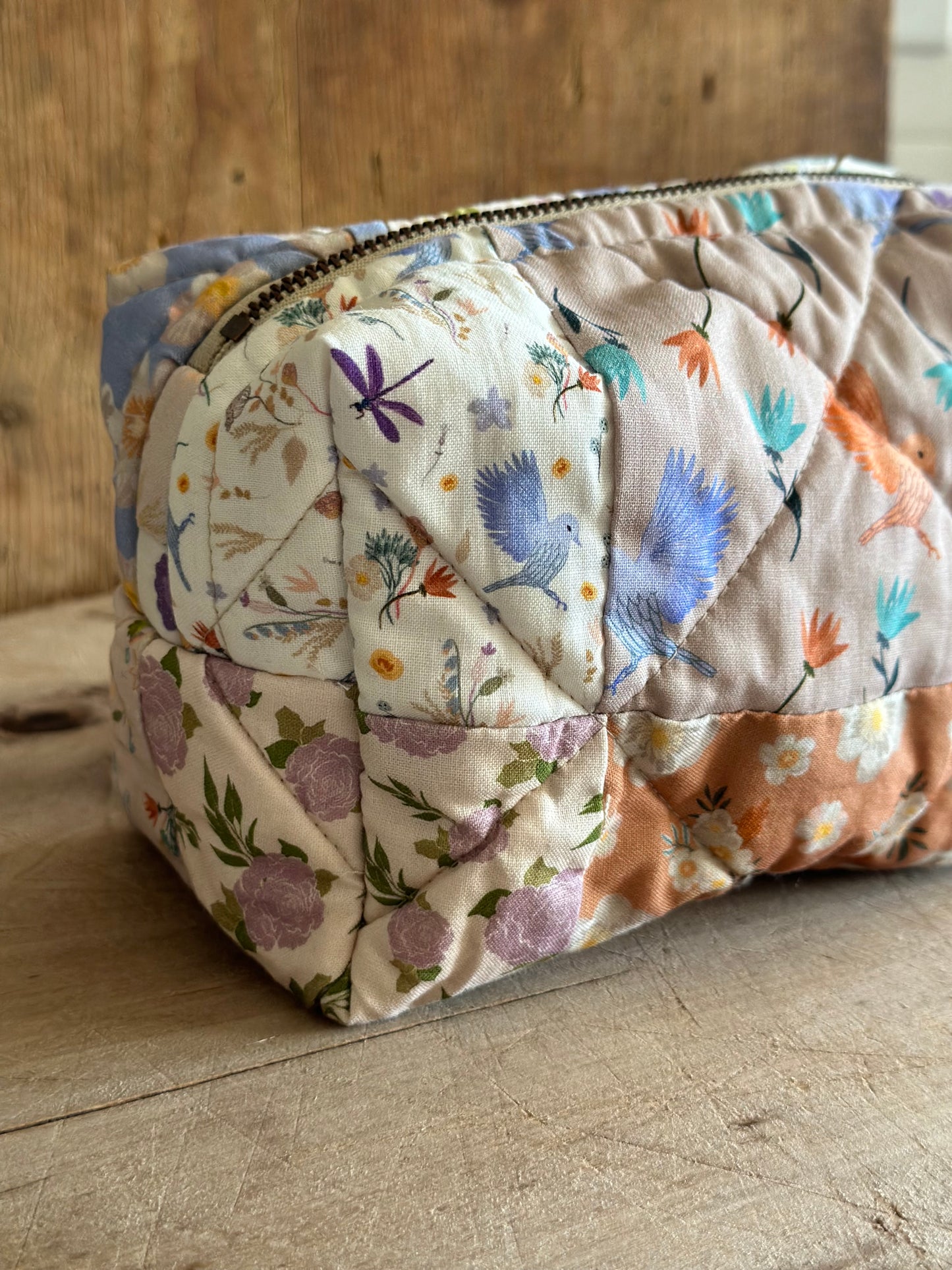 Quilted floral fabric pouch, A31EA6F0