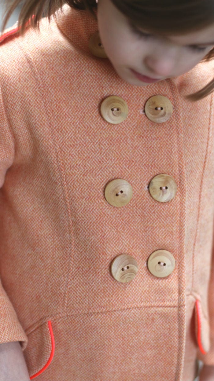 Girl in Berlin4 peach coat with large buttons
