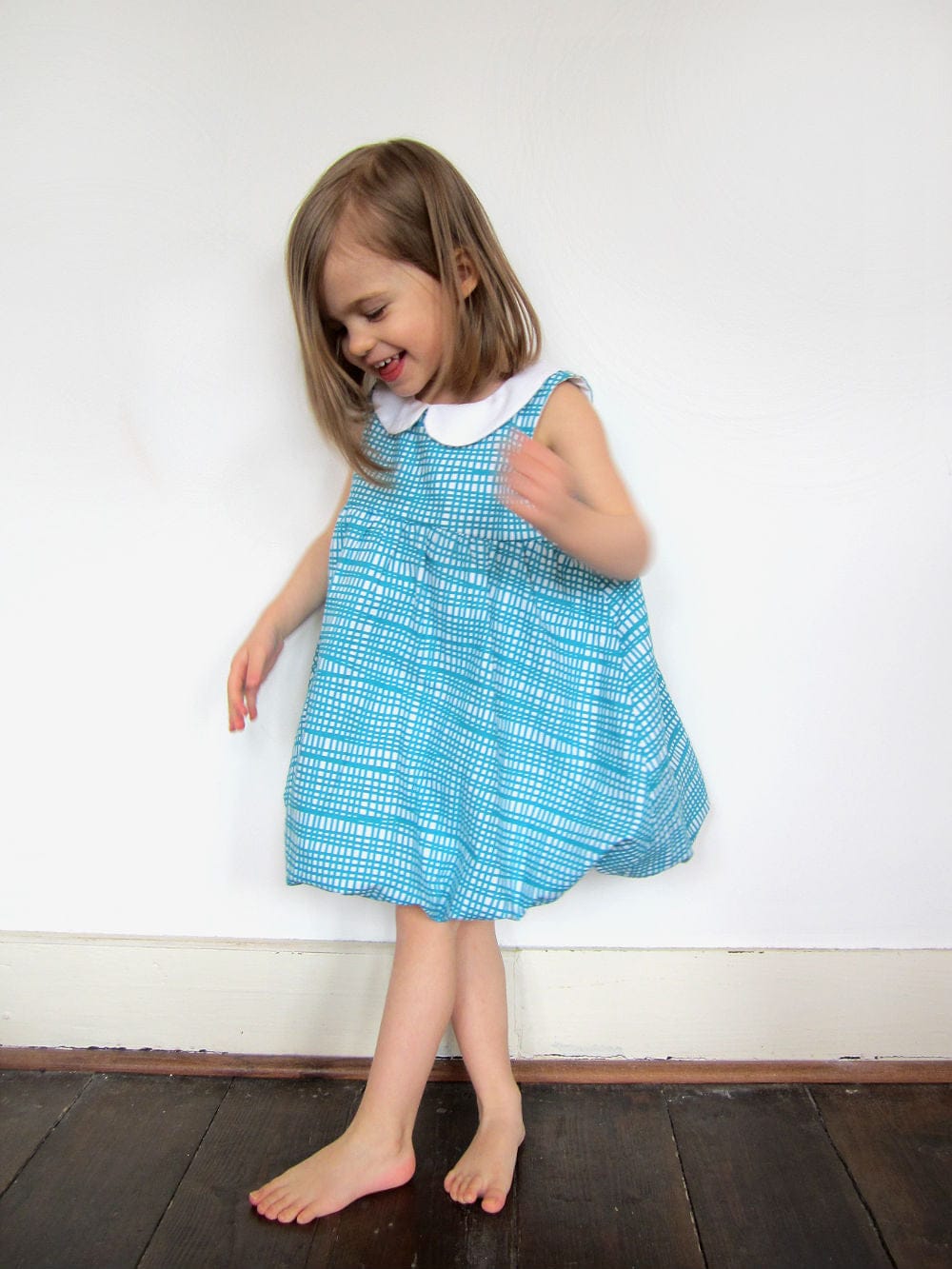Girl in blue bubble dress