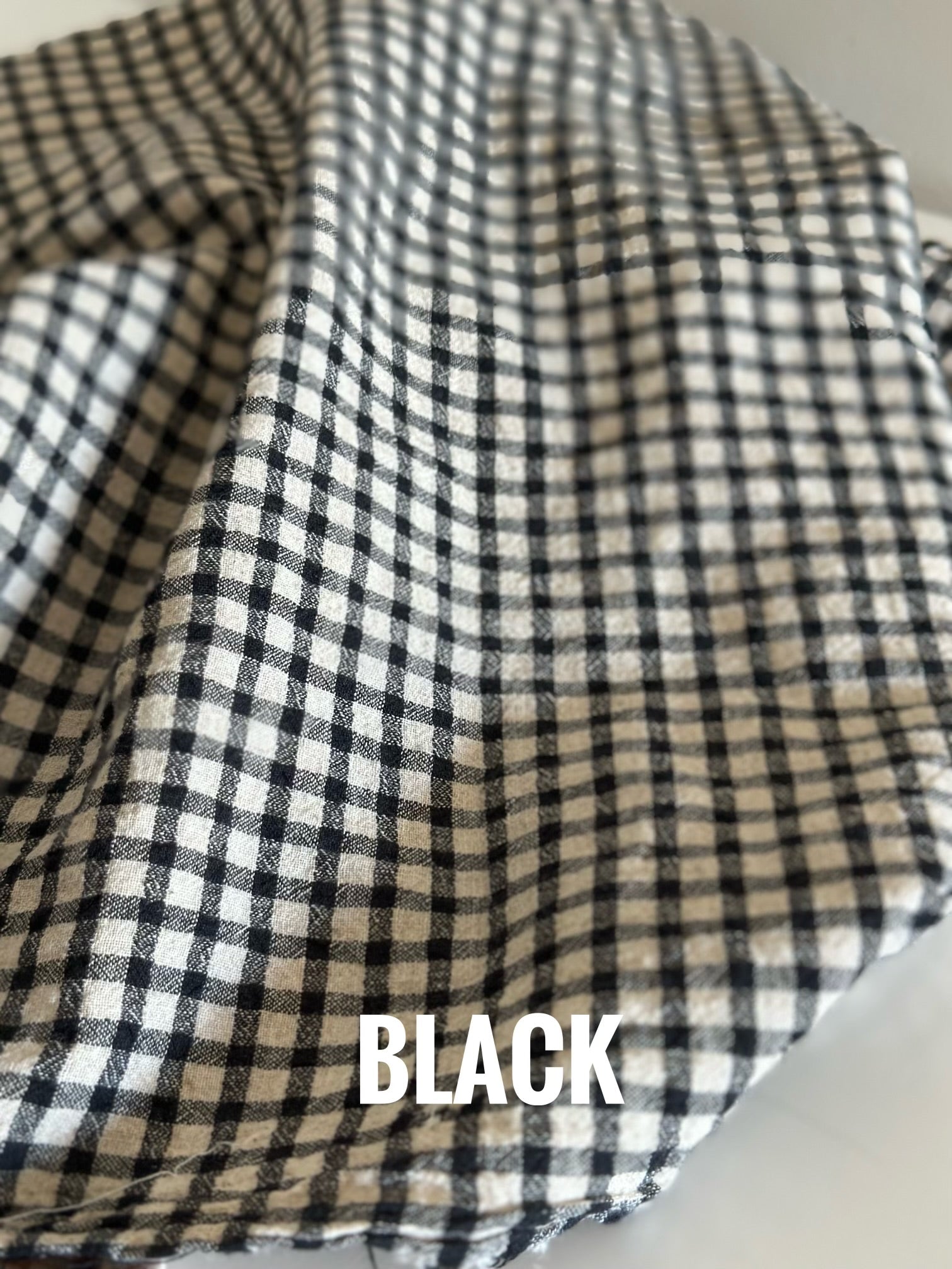 Black and white checkered fabric detail, F2683270-1046-4132-9F47-54AF25D17A00