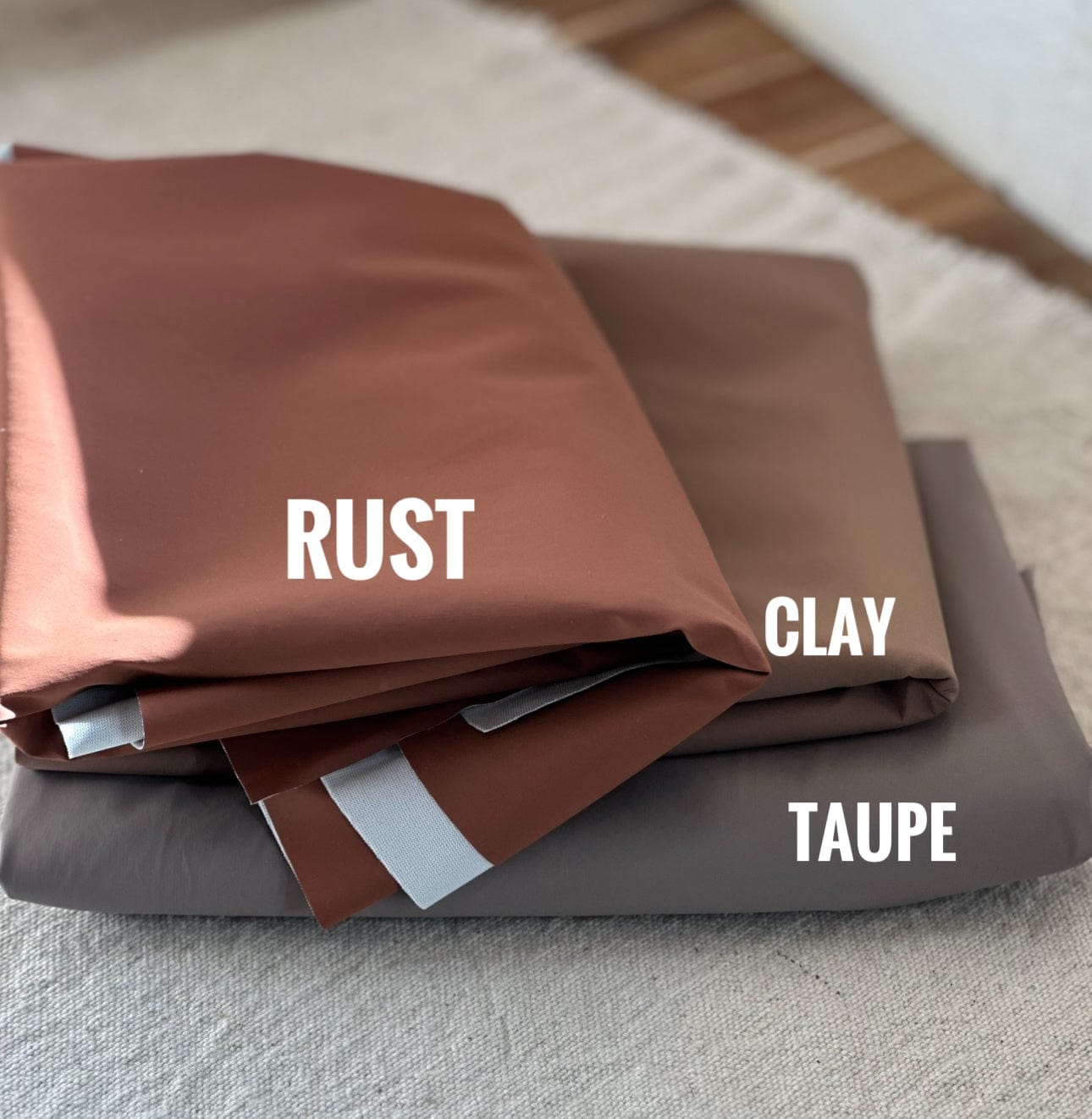 Rust, Clay, and Taupe fabric swatches.