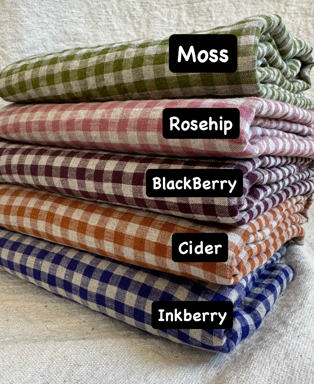 Gingham fabric rolls in Moss, Rosehip, Blackberry, Cider, Inkberry