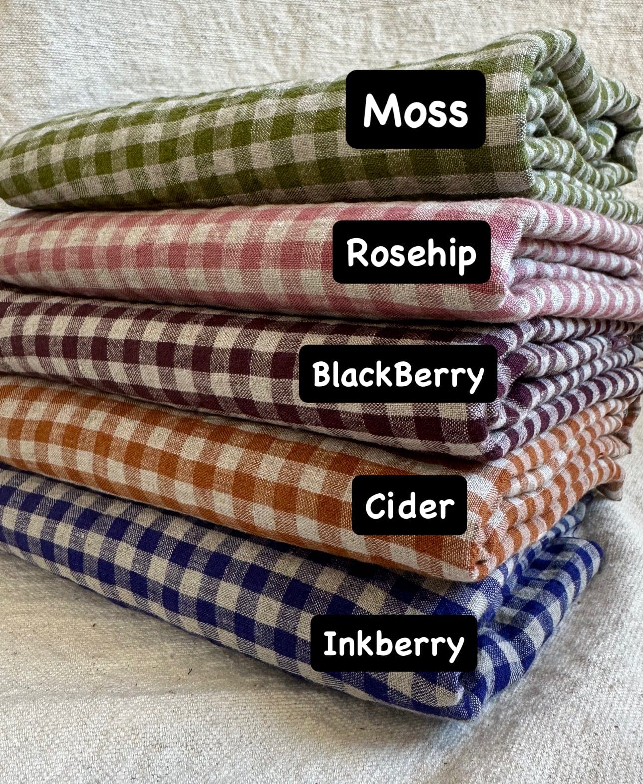 Gingham fabric rolls in Moss, Rosehip, Blackberry, Cider, Inkberry