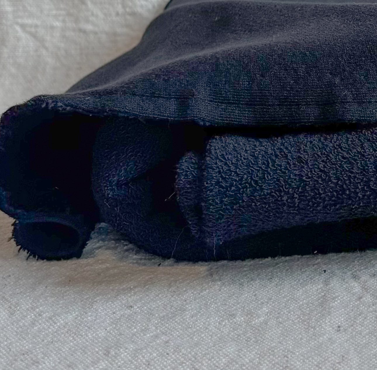 Folded dark blue towel