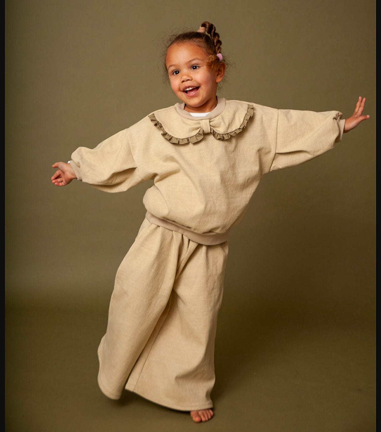 Girl in beige outfit, FullSizeRender
