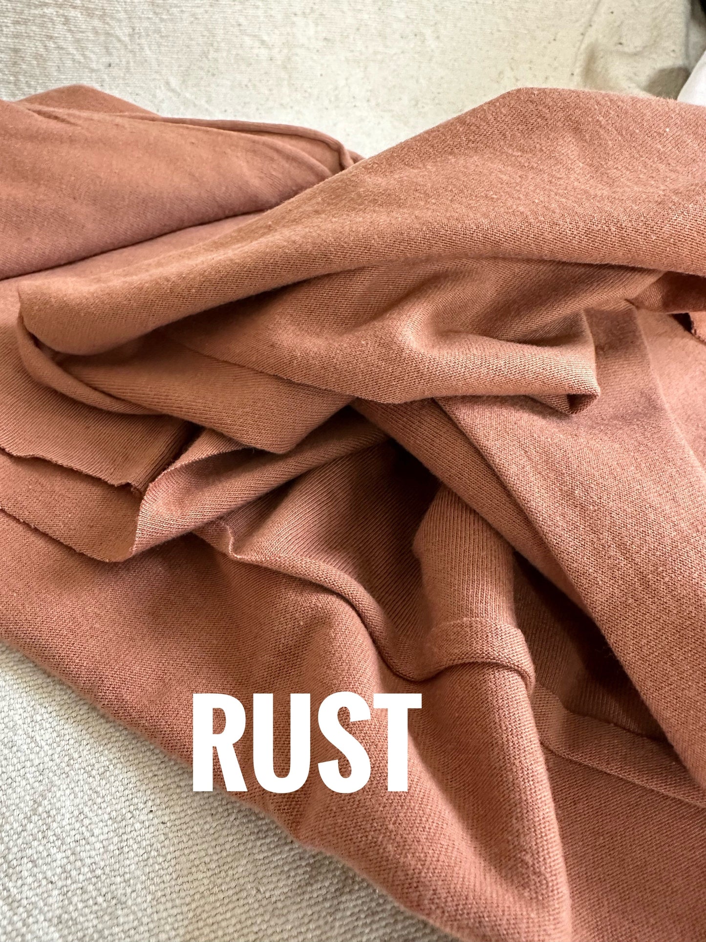 Rust-colored fabric, FullSizeRender