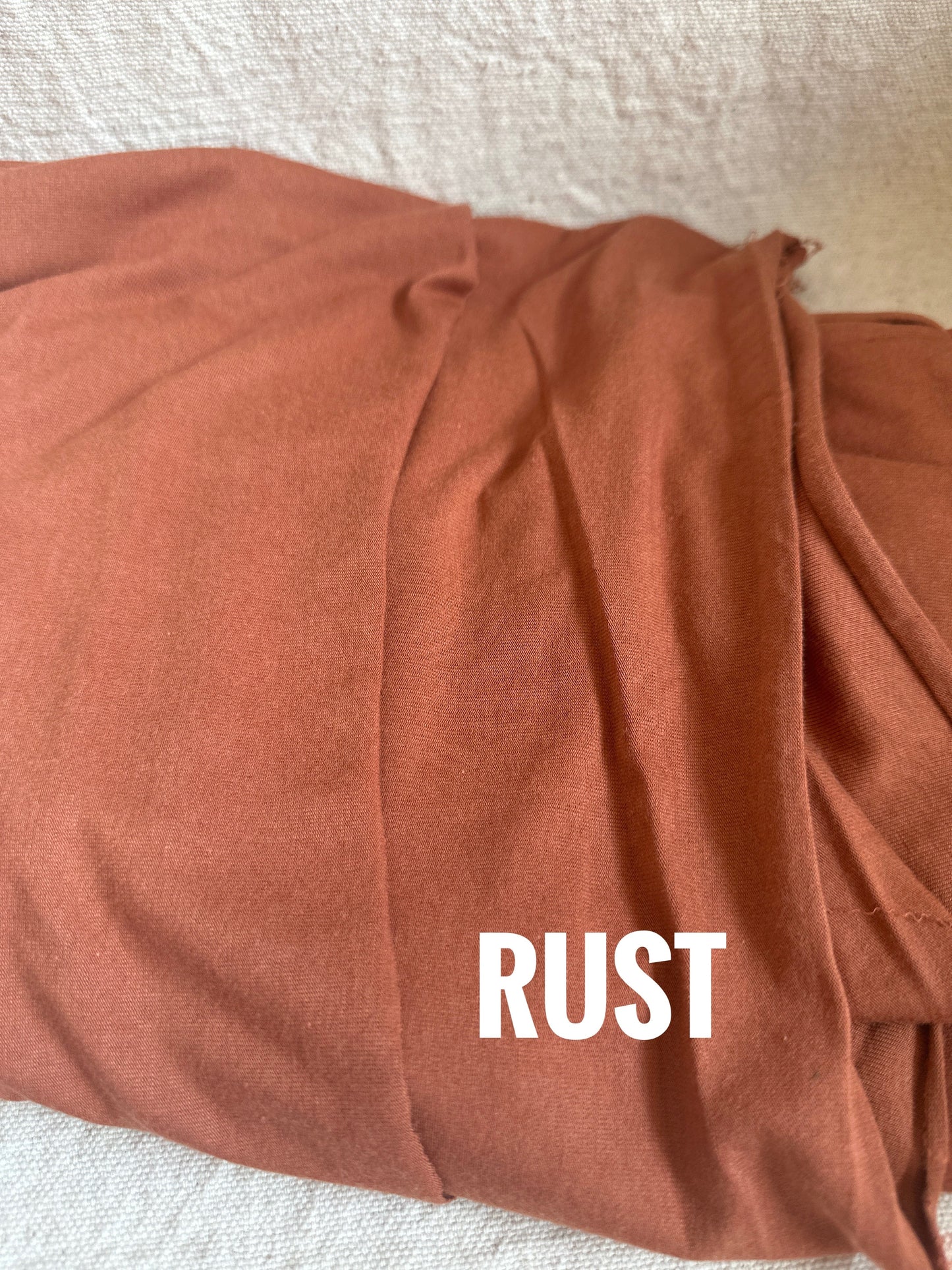 Rust-colored fabric, FullSizeRender