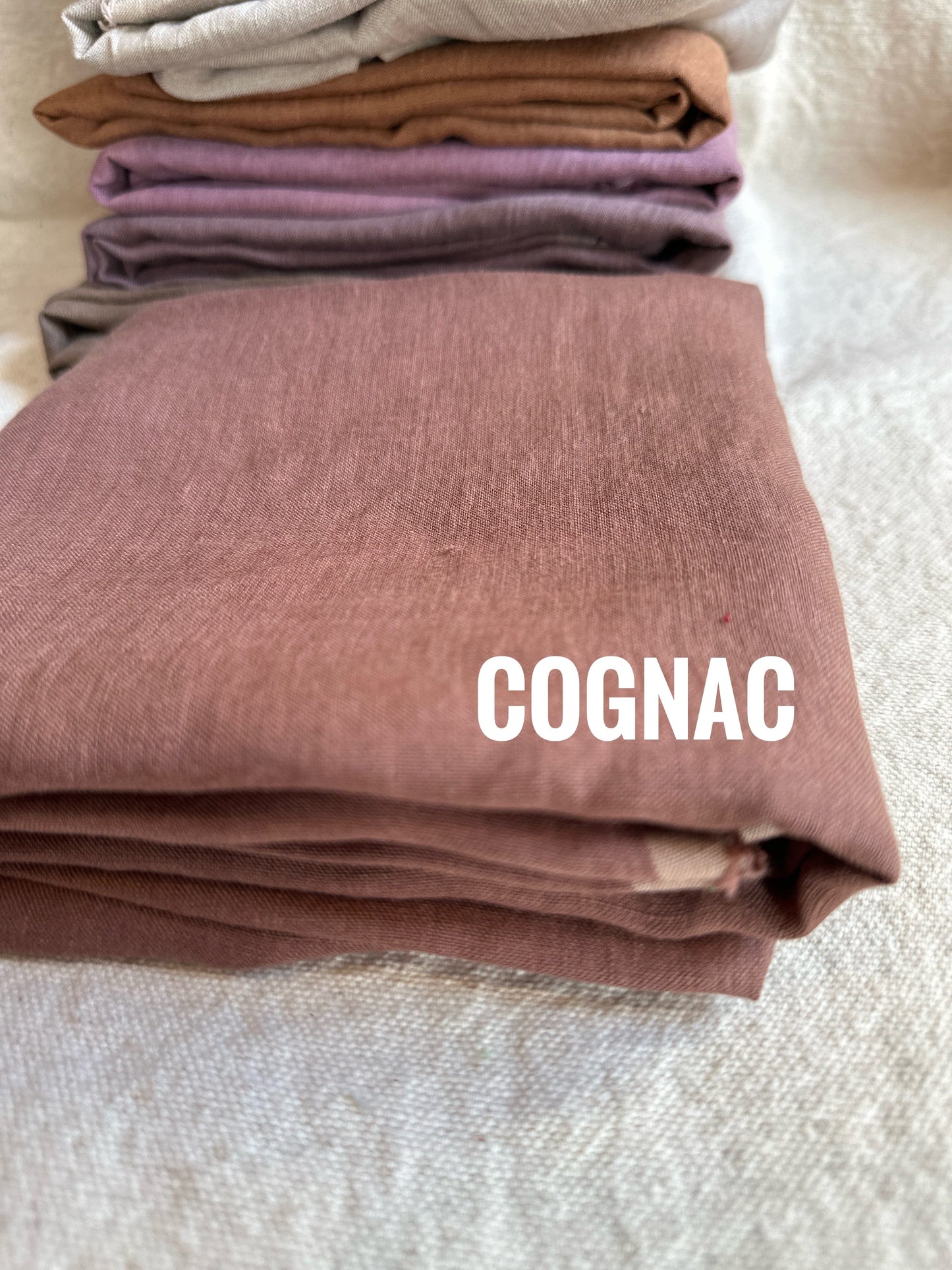 Cognac colored fabric stack