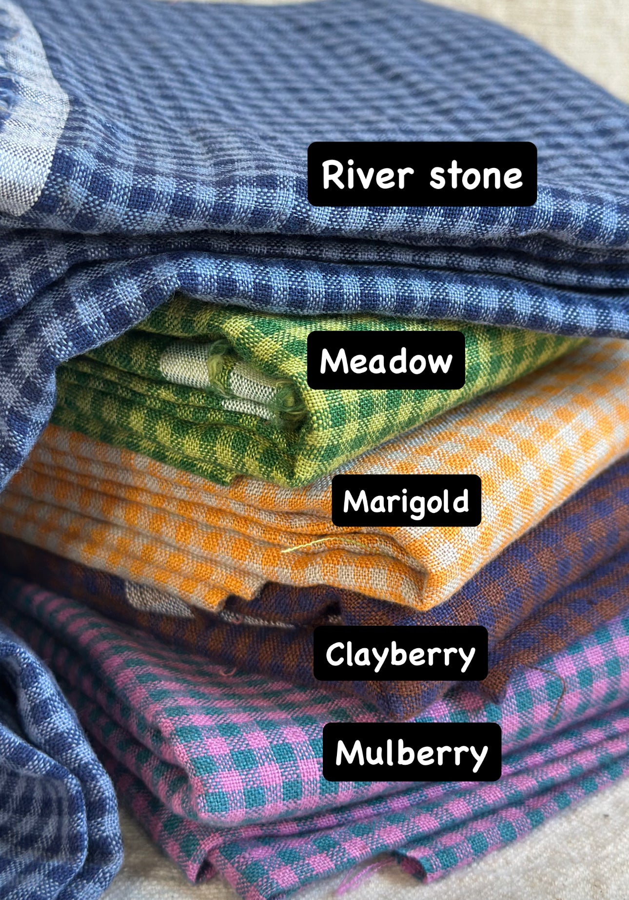 Gingham fabric swatches in River stone, Meadow, Marigold, Clayberry, Mulberry