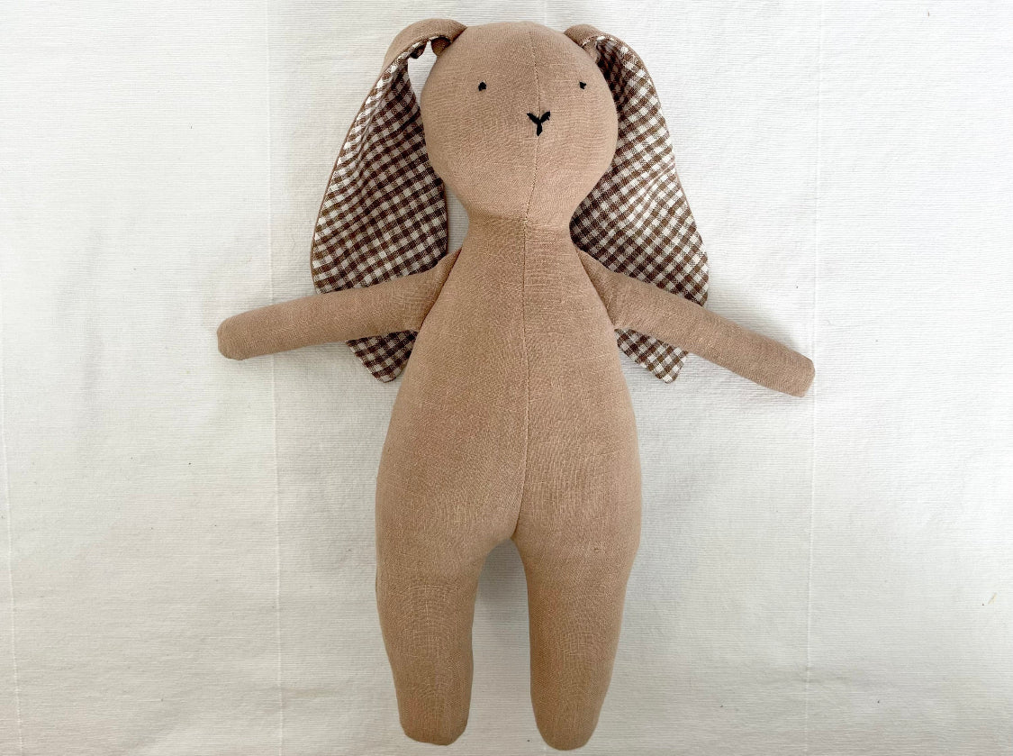 Brown stuffed bunny with checkered ears