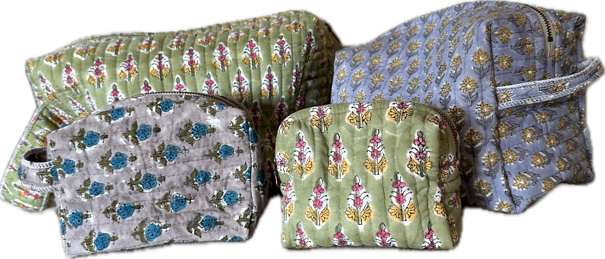 Printed fabric cosmetic bags in various sizes.
