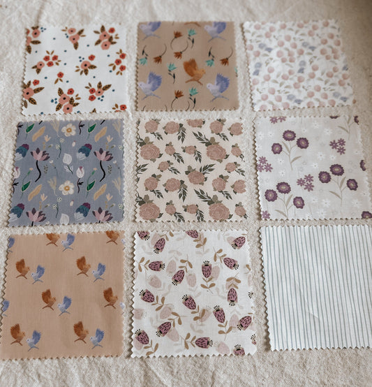 Nine fabric squares with floral patterns