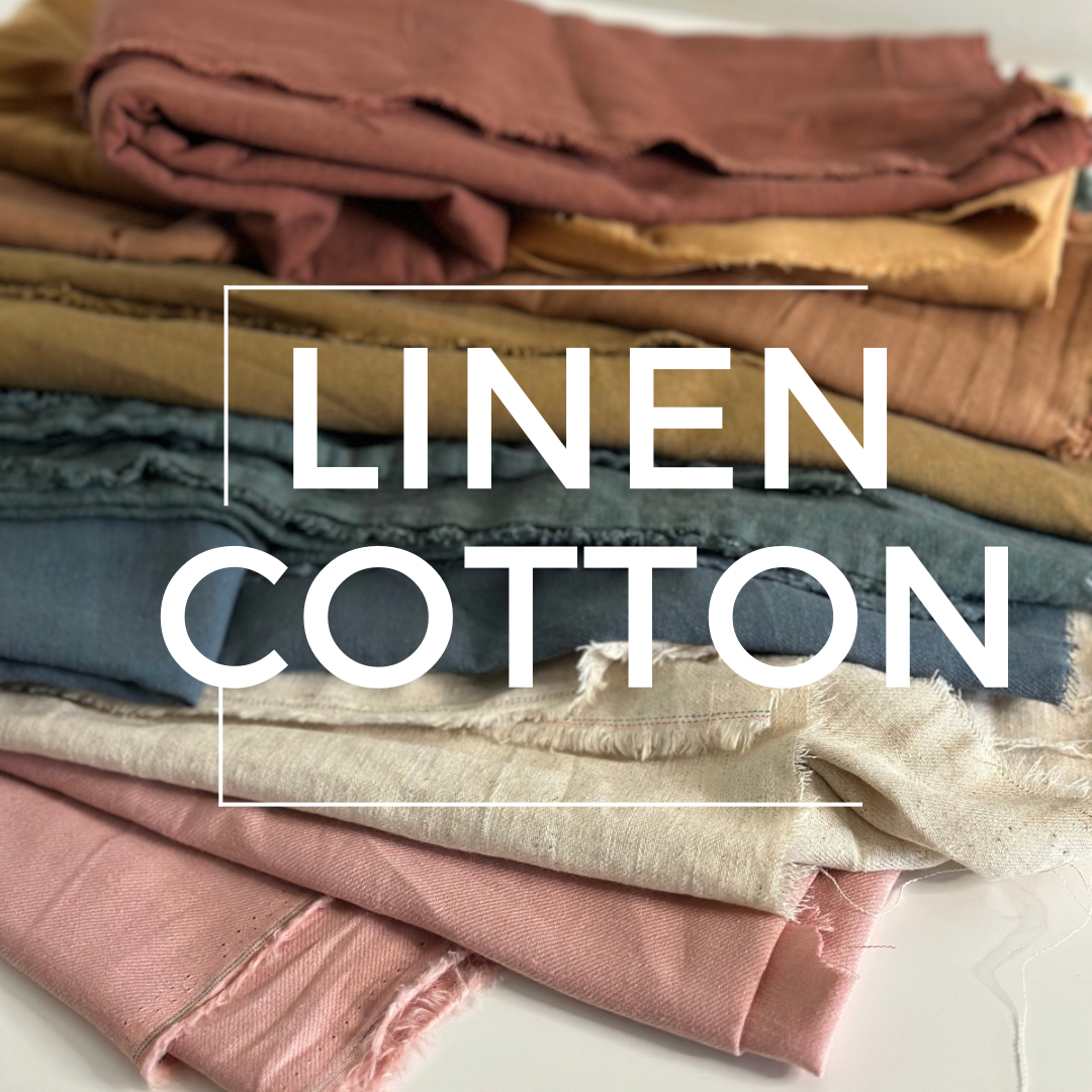 Pile of colorful linen and cotton fabric.