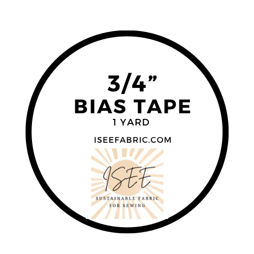 Black circle with bias tape label.
