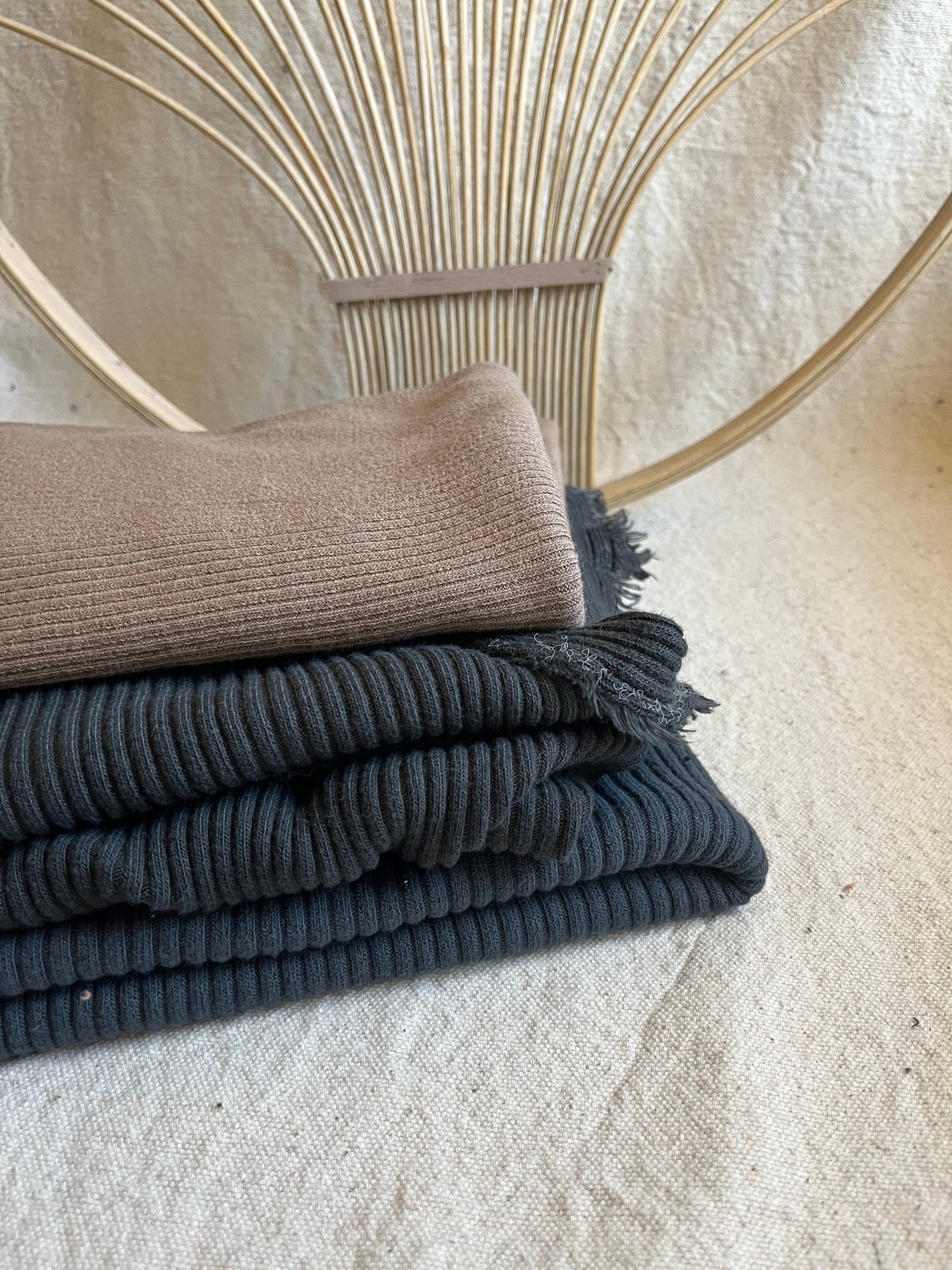 Stacked corduroy fabric with woven background.