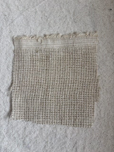 Square piece of woven fabric.