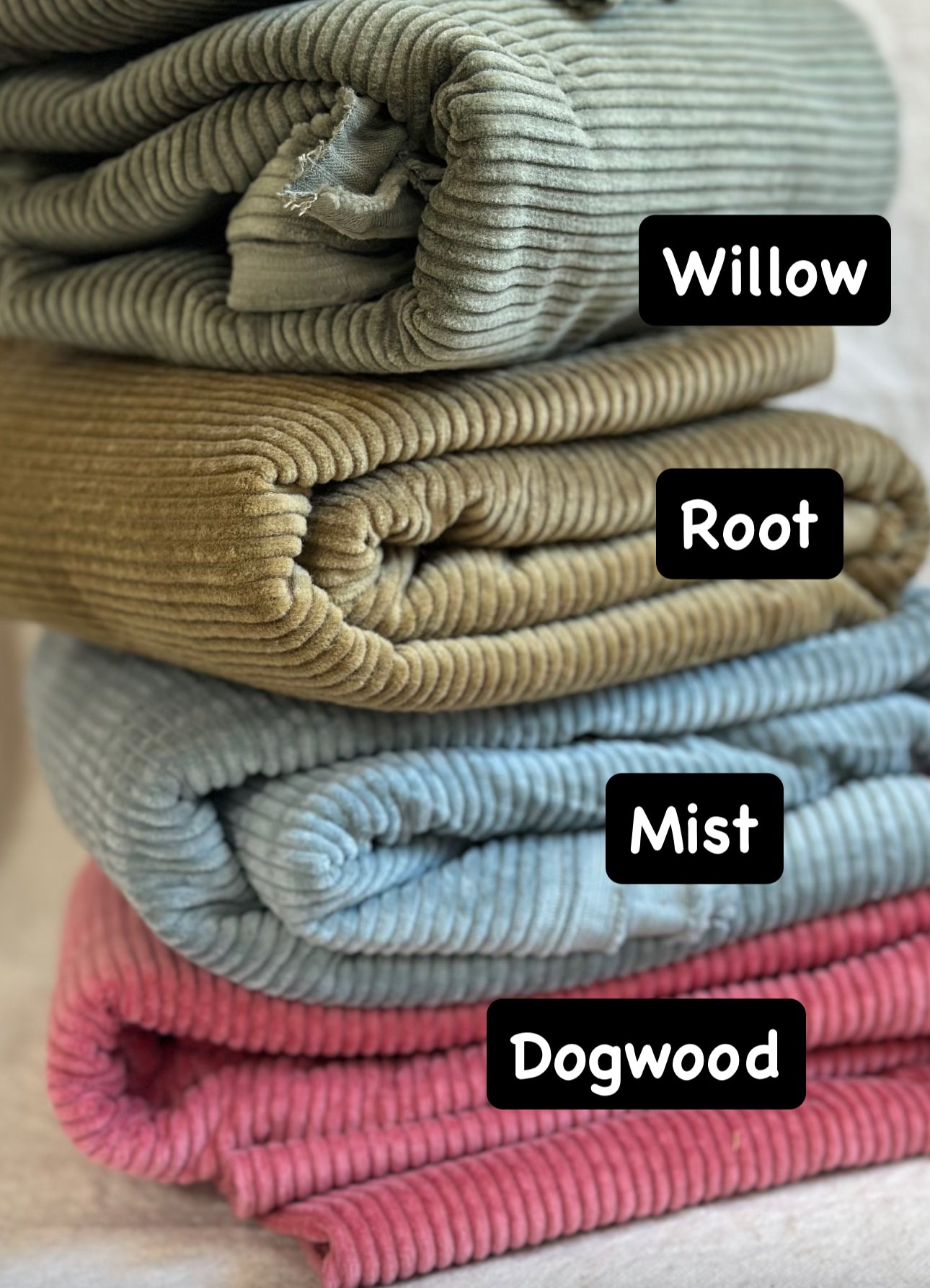 Corduroy fabric samples in Willow, Root, Mist, and Dogwood